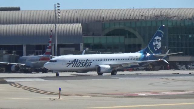 Boeing 737-800 (N518AS) - Taxing over to Runway 20R for a departure to Seattle Tacoma.