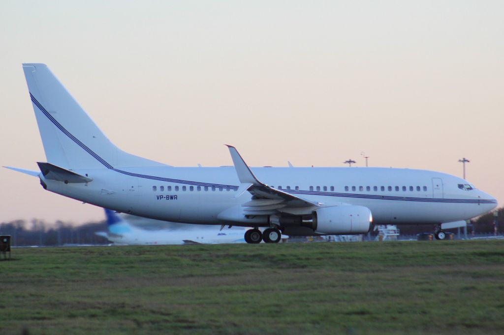 Boeing 737-700 (VP-BWR) - A Privately Owned B737-700 taking off from runway 22 at Stansted Airport.br /br /Location: Stansted Airport.br /Date: 26.12.22 (dd/mm/yy).