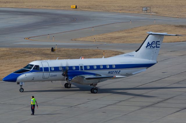 N127CZ — - Air Charter Express ACE EMB-120 is taxing out of Signature Aviation at Des Moines International Airport. The ACE 120 have been coming in a lot the last couple of months as they have been operating charters for Duke University Men's Basketball Team. This photo was taken February 20, 2022 at 2:50 PM CST with Nikon D3200 at 170mm.