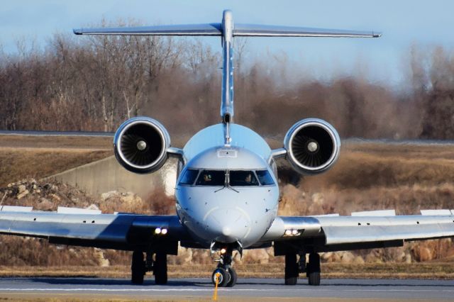 Canadair Regional Jet CRJ-700 (N706PS) - N706PS landing on Runway 32 at the Buffalo Niagara International Airport from Charlotte (KCLT) as JIA5075