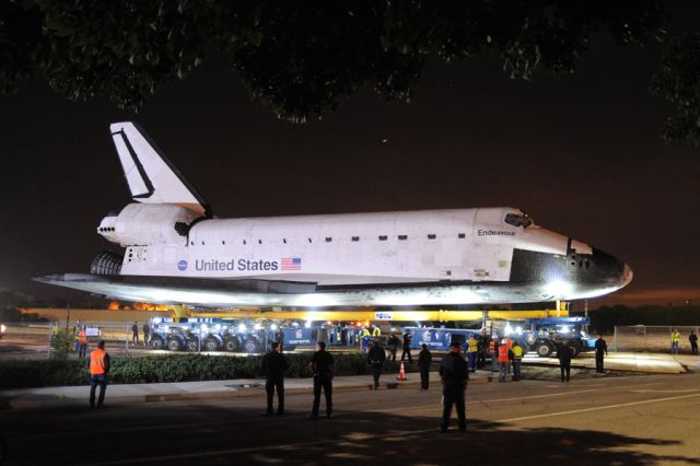 — — - Shuttle Edeavour shortly after departing LAX.