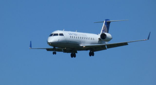 Canadair Regional Jet CRJ-200 (N930SW) - On final is this 2002 United Express Canadair Regional Jet 200LR from the Spring of 2021.