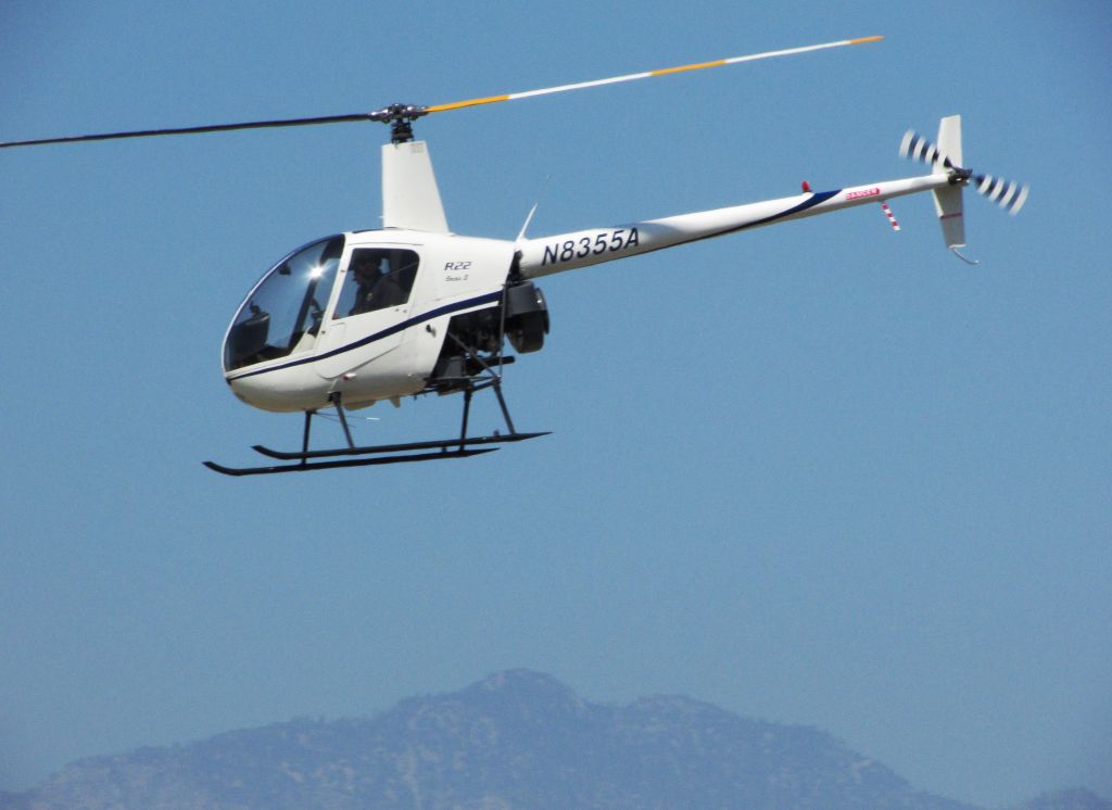 Robinson R-22 (N8355A) - Lifting off from Brackett Field