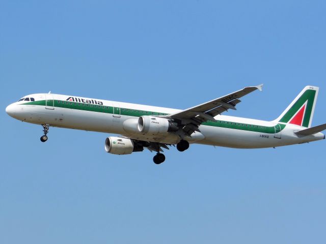 Airbus A321 (I-BIXQ) - Alitalia (AZ) I-BIXQ A321-112 [cn586]br /London Heathrow (LHR). Alitalia flight AZ238 arriving from Milan Linate (LIN). br /Alitalia began repainting the fleet with a new livery from June 2015, as new 49% owner-investor Etihad Airways (EY) attempted a revamp of the brand. This classic “Tricolor A” Alitalia livery dates back to 1969 and the arrival of AZ’s first Boeing 747’s.br /Taken from Myrtle Avenue Gardens, Hatton Cross (27L approach)br /2013 07 06  a rel=nofollow href=http://alphayankee.smugmug.com/Airlines-and-Airliners-Portfolio/Airlines/EuropeanAirlineshttps://alphayankee.smugmug.com/Airlines-and-Airliners-Portfolio/Airlines/EuropeanAirlines/a