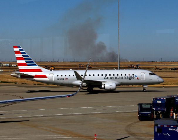 Embraer 175 (N217NN) - KSMF - E-175 of American Eagle rolling to gate A2.click full.