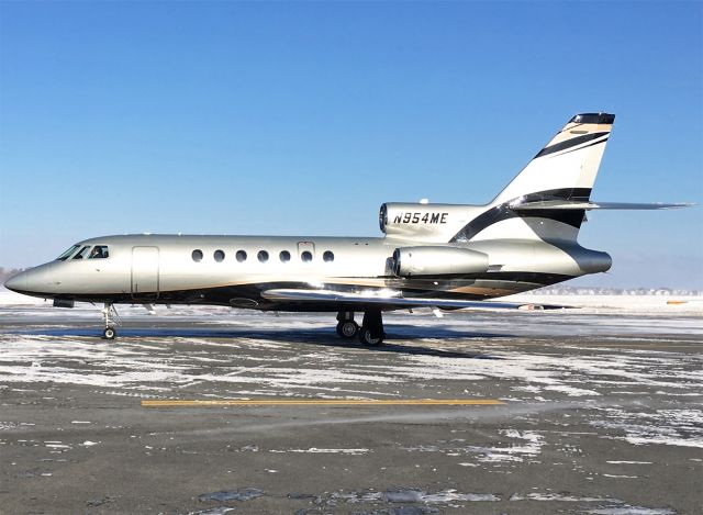 Dassault Falcon 50 (N954ME) - Love this livery on an immaculate Falcon 50 on a snowy SFS ramp