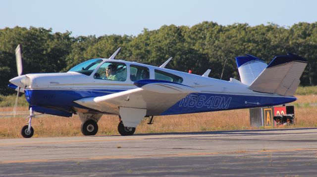 Beechcraft 35 Bonanza (N664DM) - Taxiing in at MVY, 2 September 2022.