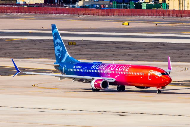 Boeing 737-900 (N493AS) - An Alaska Airlines 737-900 in More to Love special livery taxiing at PHX on 2/28/23. Taken with a Canon R7 and Canon EF 100-400 L ii lens.