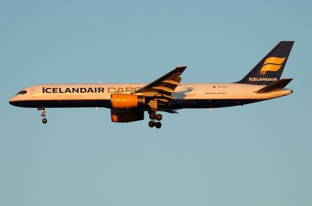 Boeing 757-200 (TF-FIH) - ICE 763; arriving at sunrise on 22L. All Icelandair Cargo planes now carry the President of Iceland’s Export Award Seal, awarded for achievement in the exporting of Icelandic products and services to overseas markets.