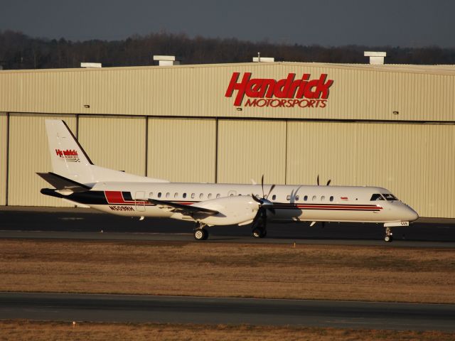 Saab 2000 (N509RH) - Taxiing from the Hendrick Motorsports hangar to runway 20 at Concord Regional Airport, bound for Daytona - 2/15/09