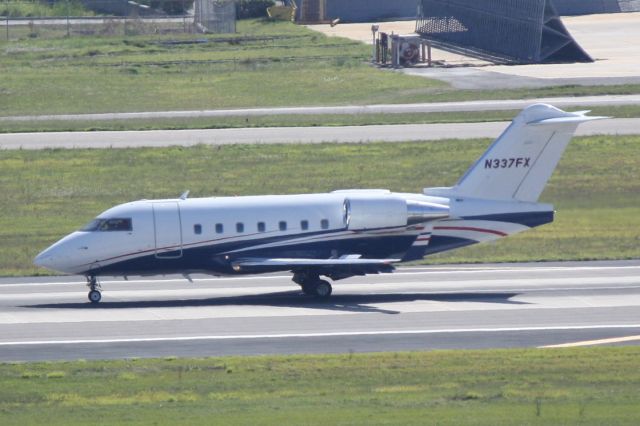 Canadair Challenger (N337FX) - Solutions Flight 337 (N337FX) arrives on Runway 1R at Tampa International Airport following a flight from Washington-Dulles International Airport