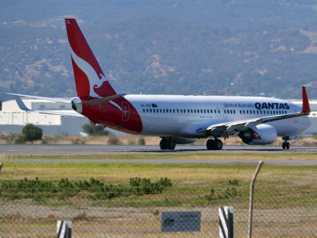 Boeing 737-800 (VH-VZB) - On taxi-way heading for take off on runway 05. Thursday 12th April 2012.