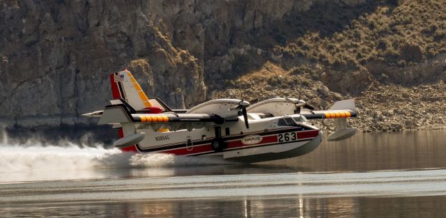 Canadair CL-415 SuperScooper (N385AC) - CL-215-6B11 (CL-415) operating from Clark Canyon Reservoir near Dillon Montana on the Bear Creek Fire