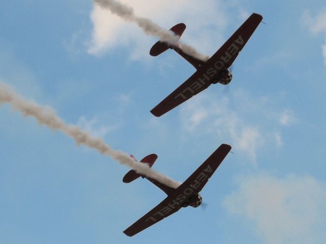 North American T-6 Texan (N3267G) - A great view from GA Camping of the Aeroshell T-6 Texans at Sun-N-Fun 2016