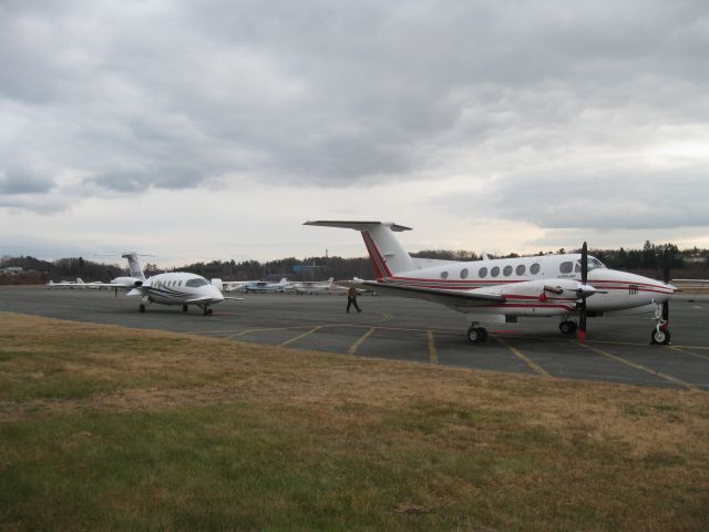 Beechcraft Super King Air 300 (N58ES) - Two turboprops on the ramp. N195SL is the P180  behind the King Air.