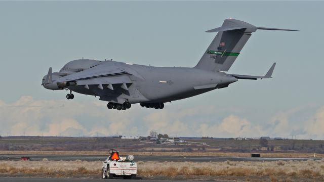 Boeing Globemaster III (03-3127) - "HUSKY 22" flies a missed approach to Rwy 32R on 11/8/13. (cn F134/P127).  The aircraft is with the 62nd AW based at McChord AFB.