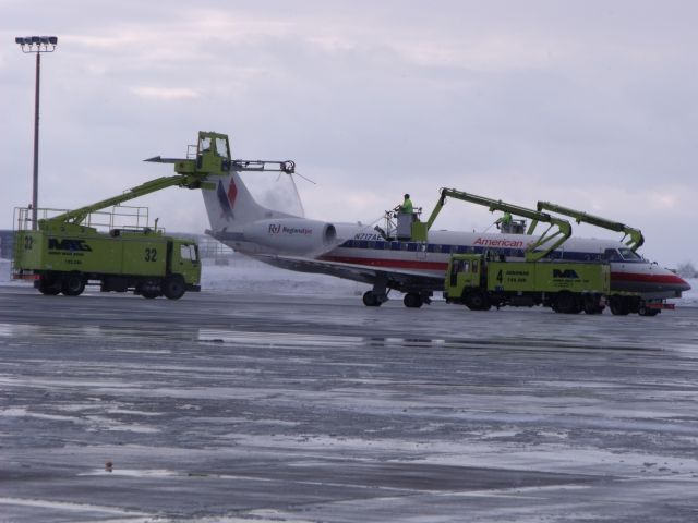 N717AE — - De-icing at Ottawa,before departing on a frigid -29 celsius.