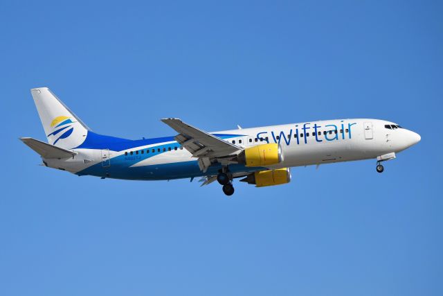 BOEING 737-400 (N802TJ) - Landing 23-R on 03-14-19. Back to back Swift arrivals along with sister ship N804TJ. First pic of this bird in new color scheme on the data base. Formerly used as John McCain campaign, and Rolling Stones Tour Aircraft. This bird got some history on it!