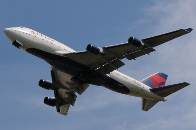 Boeing 747-400 (N664US) - Just found out that this aircraft was severely damaged by hail enroute to ICN on this flight 159 DTW-ICN. Lucky Catch for me. She was fine when she left DTW as you can see! Shot this departing DTW on 06-16-15