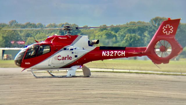 Eurocopter EC-130 (N327CH) - The lens distorted the heck out of this one, but oh well. N327CH stopping at KHUF for fuel. br /br /This aircraft is a 2015 Airbus Helicopters EC130 T2, SN 8095, owned by Air Methods. 9/17/22. 