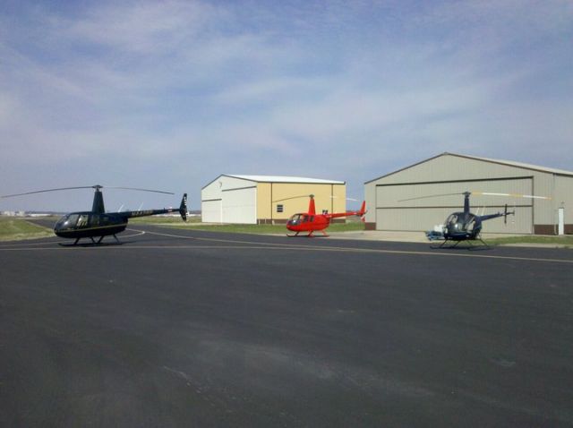 — — - Cape Copters Fleet on the ramp at KCGI