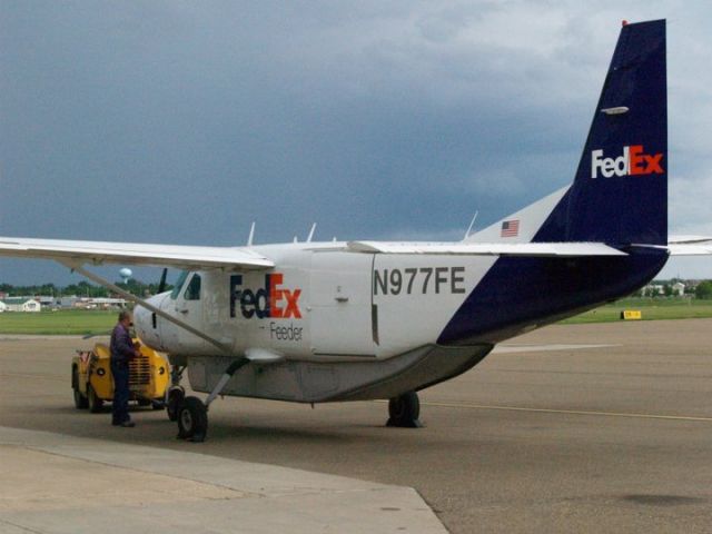 Cessna Caravan (N977FE) - Getting ready for departure at Williston INTL. KISN