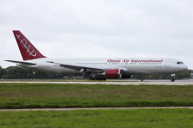 BOEING 767-300 (N378AX) - Caribbean Airlines - BW902 Operated by Omni Air International (N378AX) Seen vacating RWY 26L, Gatwick Airport. Courtesy Chris Goodwin - AirTeamImages ©