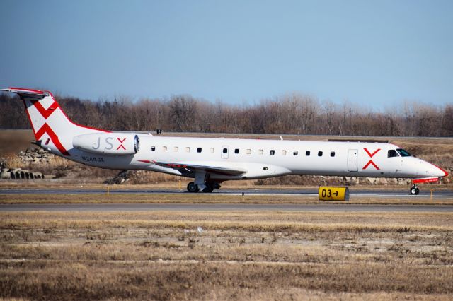 Embraer ERJ-145 (N244JX) - N244JX (operating as JSX9401) taxiing to Ruwnay 23 at Buffalo (KBUF) before heading onto Dallas-Love Field (KDAL)