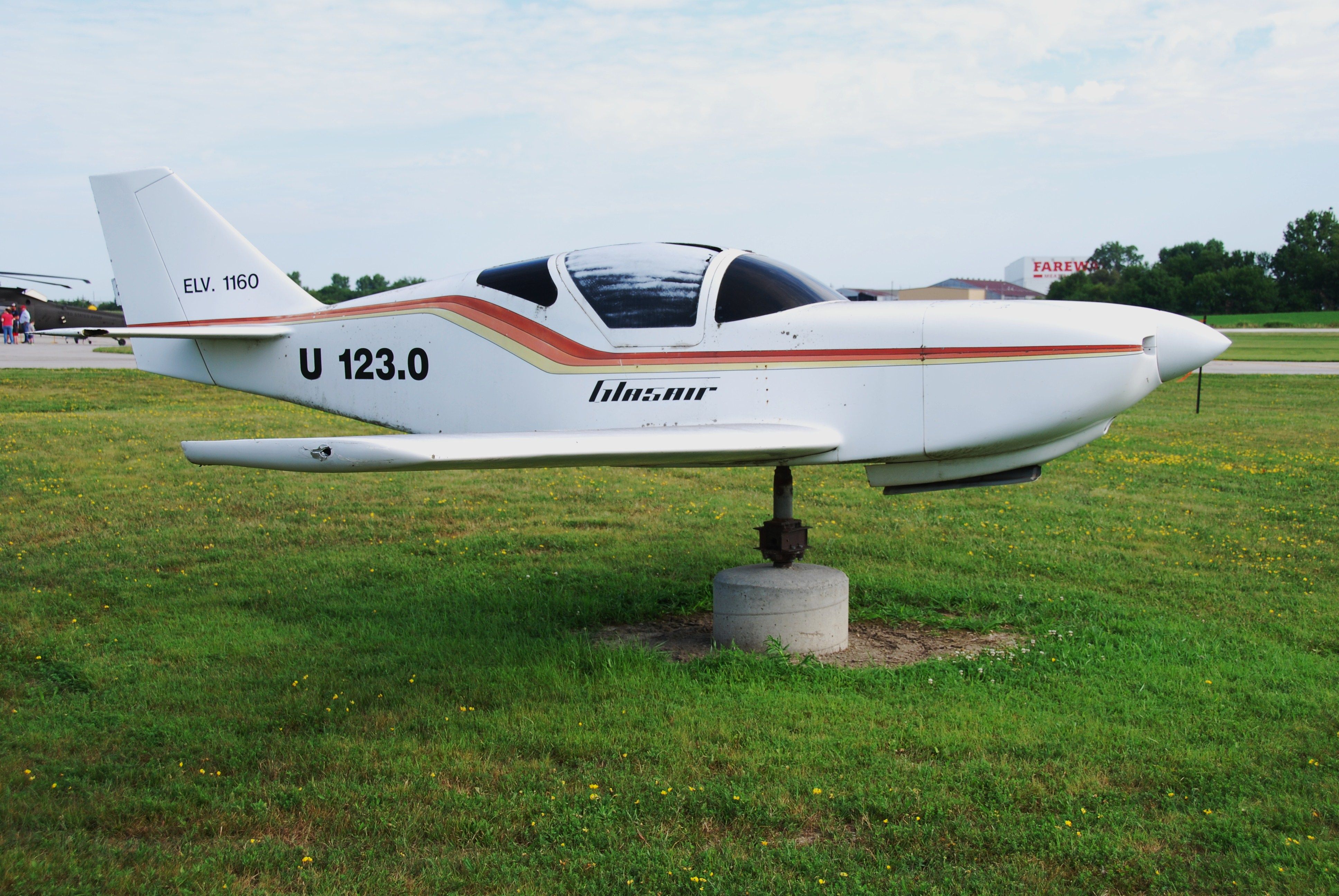 STODDARD-HAMILTON Glasair (U1230) - The unusual wind direction indicator at Boone airport in Iowa. The story, as best I remember being told by the late Connie Younger, was that the aircraft arrived one day, the pilot got out and walked away, never to be seen again. So they mounted it. 