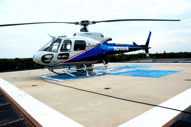 Eurocopter AS-350 AStar (N350AM) - This AStar is a back up rotor for Air Methods of Denver.  Here it is seen on Flight For Life Lifeguard 3s pad at Penrose Hospital in Colorado Springs.