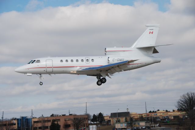 Dassault Falcon 50 (C-GMII) - Magna Intl. Falcon 50 C-GMII arriving home at Torontos Buttonville Airport CYKZ.  March 29/10