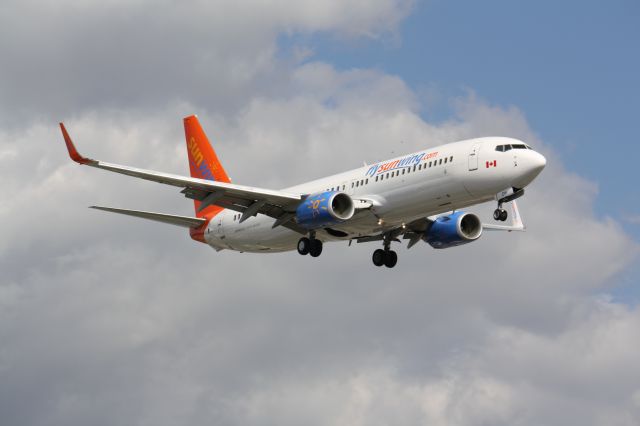 Boeing 737-800 (C-FTOH) - Landing Lester B. Pearson Intl Airport.