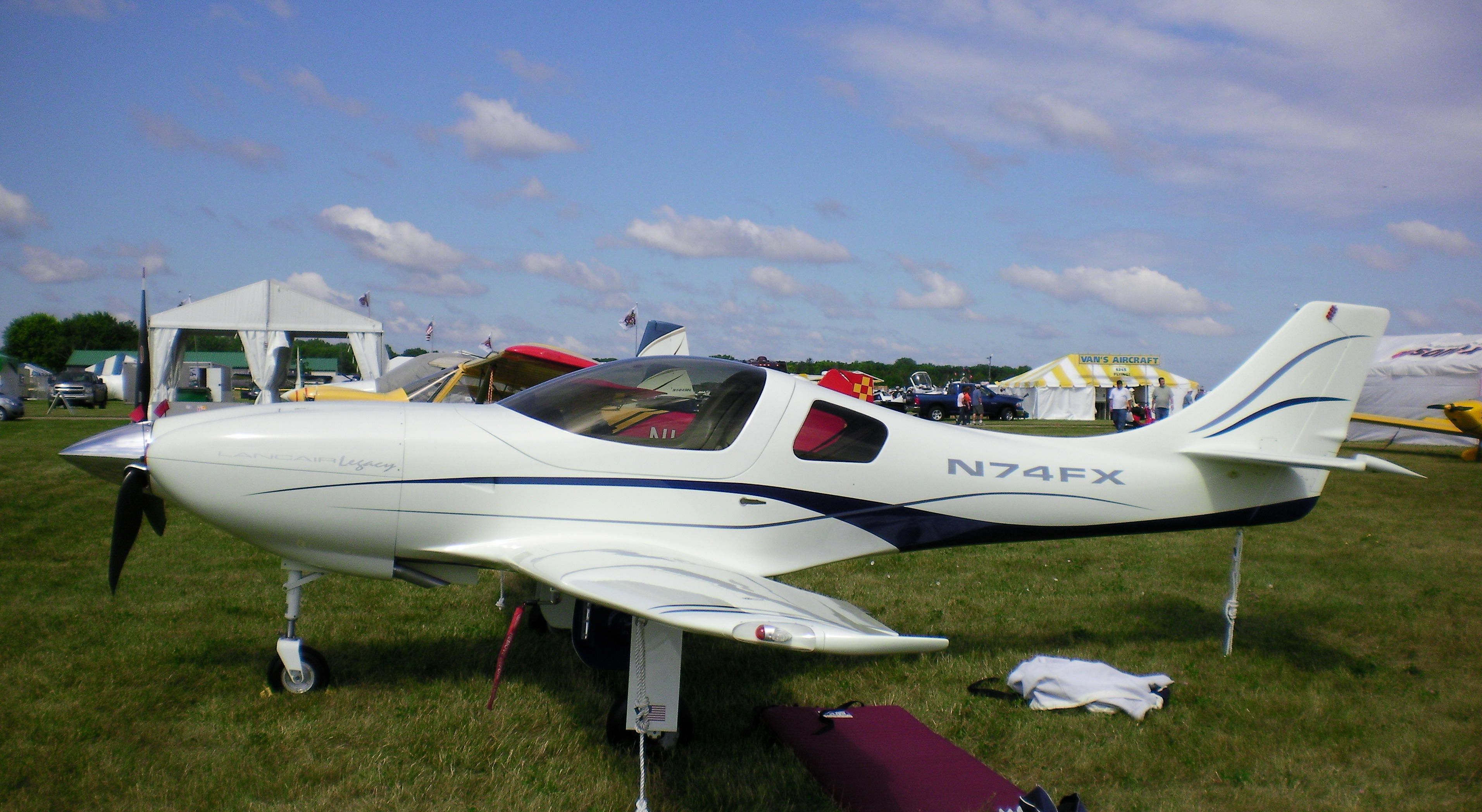 Lancair Legacy 2000 (N74FX) - N74FX was displayed with other Lancair Legacies (LEG2) for AirVenture 2009 at Oshkosh. Should not be confused with N74SX which is a SX-300. In 2019, N74FX was sold and moved from California to Craig Field in Jacksonville, Florida.