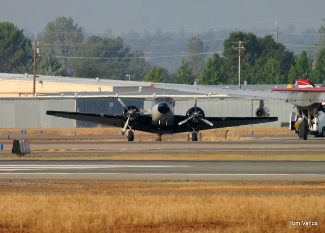 Beechcraft 18 (N29BA) - KRDD - N29BA on taxi past the fire bombers