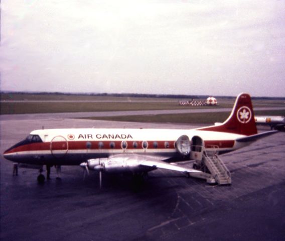 VICKERS Viscount (C-FTHL) - This is Air Canada Viscount CF-THL being readied to leave Ottawa for Montreal in late summer of 1973. Photographs by Alfred Holden. Viscount service was winding down, at the time. As a teenager I somehow rounded up the fare to fly Ottawa-Montreal (Viscount) and Montreal-Burlington Vt. (Allegheny BAC-1-11) a couple of times, to visit family. All the pictures appear to be from the same trip - the aircraft, the tail, the view from my seat, the interior with flight attendant, luggage being unloaded in Montreal, plus my window seat (and a big window it was). As you can see, by this time these had four abreast seating and felt very roomy to fly in, a full-sized cabin carrying only about 40 people. Taken with my Kodak Instamatic, so not so sharp, but perhaps a nice set for folks to look at -- a Vickers Viscount near the end of its front-line service. These had been a real workhorse for Air Canada. I attempted to post the details in the appropriate field but was unable, so heres the data in the comment.