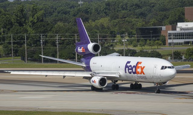 McDonnell Douglas DC-10 (N318FE) - Notice the heat blast from #2!