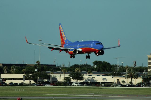 Boeing 737-700 (N7720F) - Southwest Airlines (WN) N7720F B737-7BD [cn33922]br /Houston Hobby (HOU). Southwest Airlines flight WN3501 on finals from El Paso (ELP). Wearing Southwest’s Canyon Blue Livery introduced in 2001 and since September 2014 is being replaced by the Heart liverybr /Taken from the Terminal br /2017 08 11br /a rel=nofollow href=http://alphayankee.smugmug.com/Airlines-and-Airliners-Portfolio/Airlines/AmericasAirlines/Southwest-Airlines-WNhttps://alphayankee.smugmug.com/Airlines-and-Airliners-Portfolio/Airlines/AmericasAirlines/Southwest-Airlines-WN/a