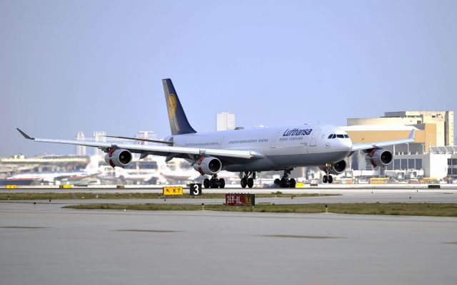 Airbus A340-300 (D-AIFE) - left main touchdown on R-26R