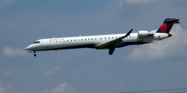 Canadair Regional Jet CRJ-900 (N549CA) - On final is this 2008 Delta Airlines Connection Canadair Regional Jet 900LR in the Summer of 2021.