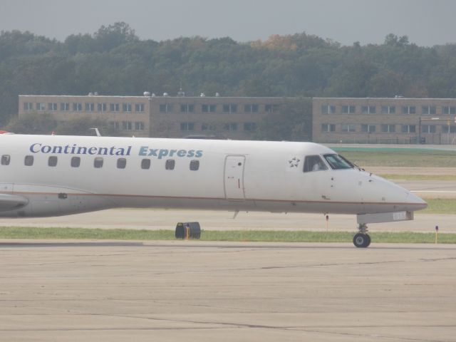 Embraer ERJ-145 (N275SK) - Good old Continental titled airplace hanging around Cleveland. A common sight in CLE, taken from gate A3