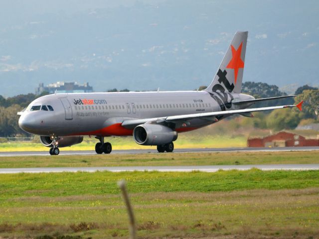 Airbus A320 (VH-VQW) - On taxi-way heading for Terminal 1, after landing on runway 23.  Wednesday 4th July 2012.