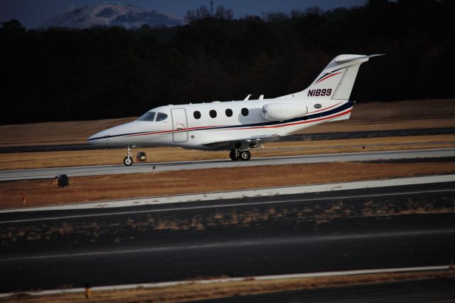 Beechcraft Premier 1 (N1899) - Stone Mountain in the background