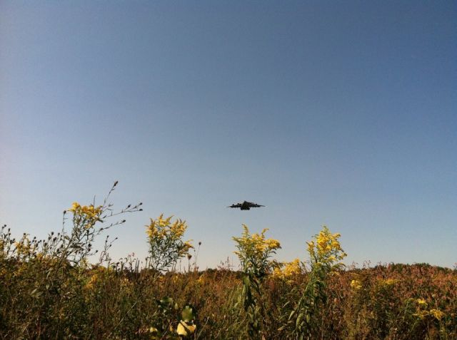 Boeing Globemaster III — - My favorite picture, Thug 21 on approach to Griffiss.