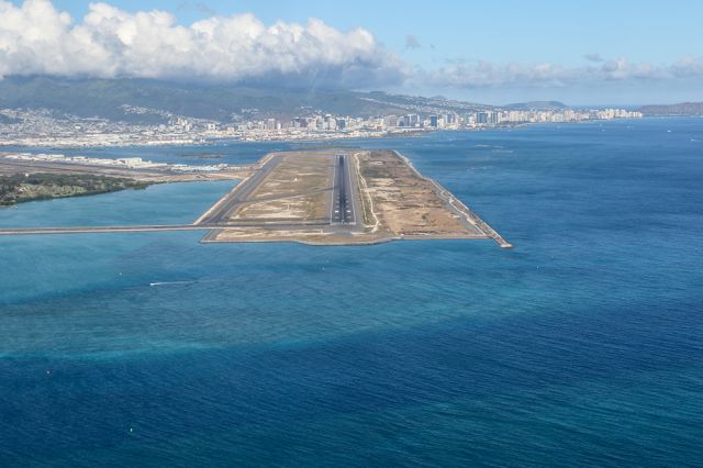 — — - Approaching the 12,000' Runway 8R / 26L at Honolulu Hawaii's HNL airport with Waikiki beach in the background. Questions about this photo can be sent to Info@FlewShots.com