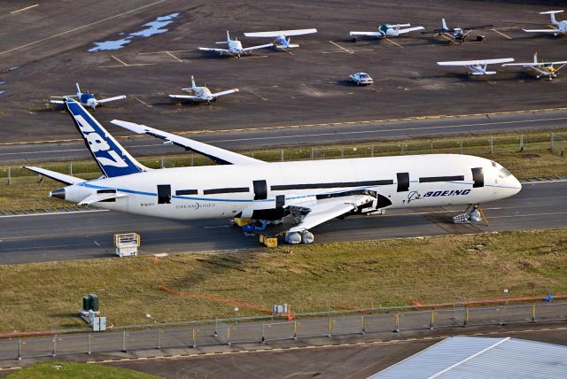 Boeing 787-8 (N787FT) - LN 5 aircraft used in certification and now sitting at PAE with no engine and some missing parts.