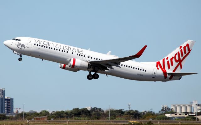 Boeing 737-800 (VH-YIQ) - Climbing from Rwy 34L