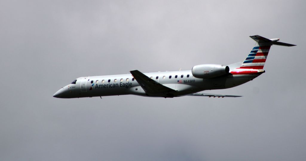 Embraer ERJ-145 (N649PP) - Shortly after departure is this 2000 American Airlines Embraer ERJ-145LR in the Summer of 2020.