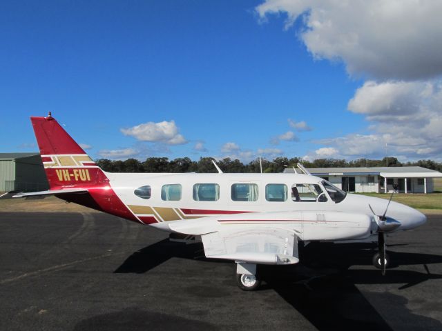 Piper Navajo (VH-FUI) - Getting avgas at Narrabri.