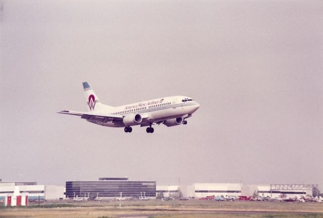 BOEING 737-300 — - America West 737 landing at Santa Ana in the mid-1980s