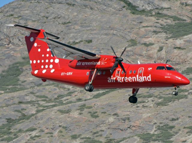 de Havilland Dash 8-200 (OY-GRH) - Just behind the fence